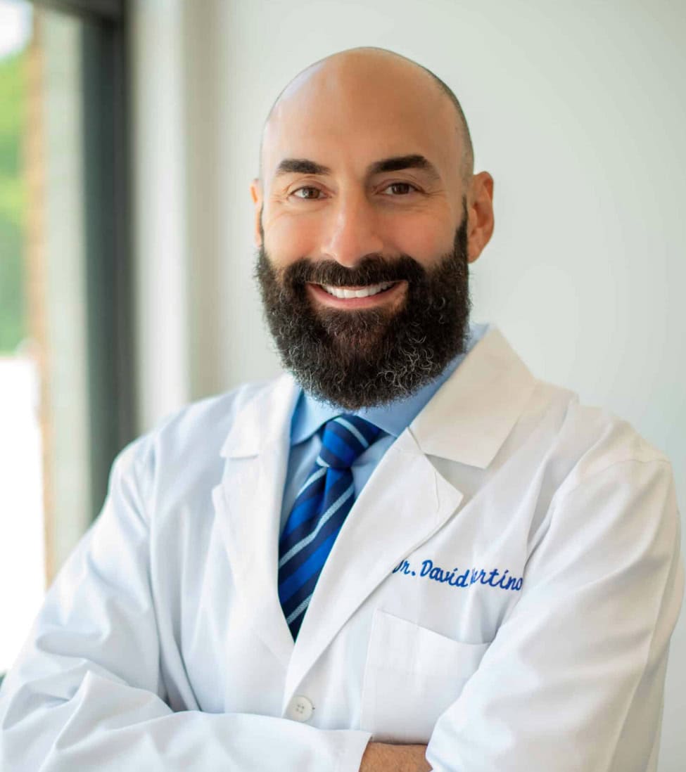 Chiropractor Examining Spine Weston Lakes, TX